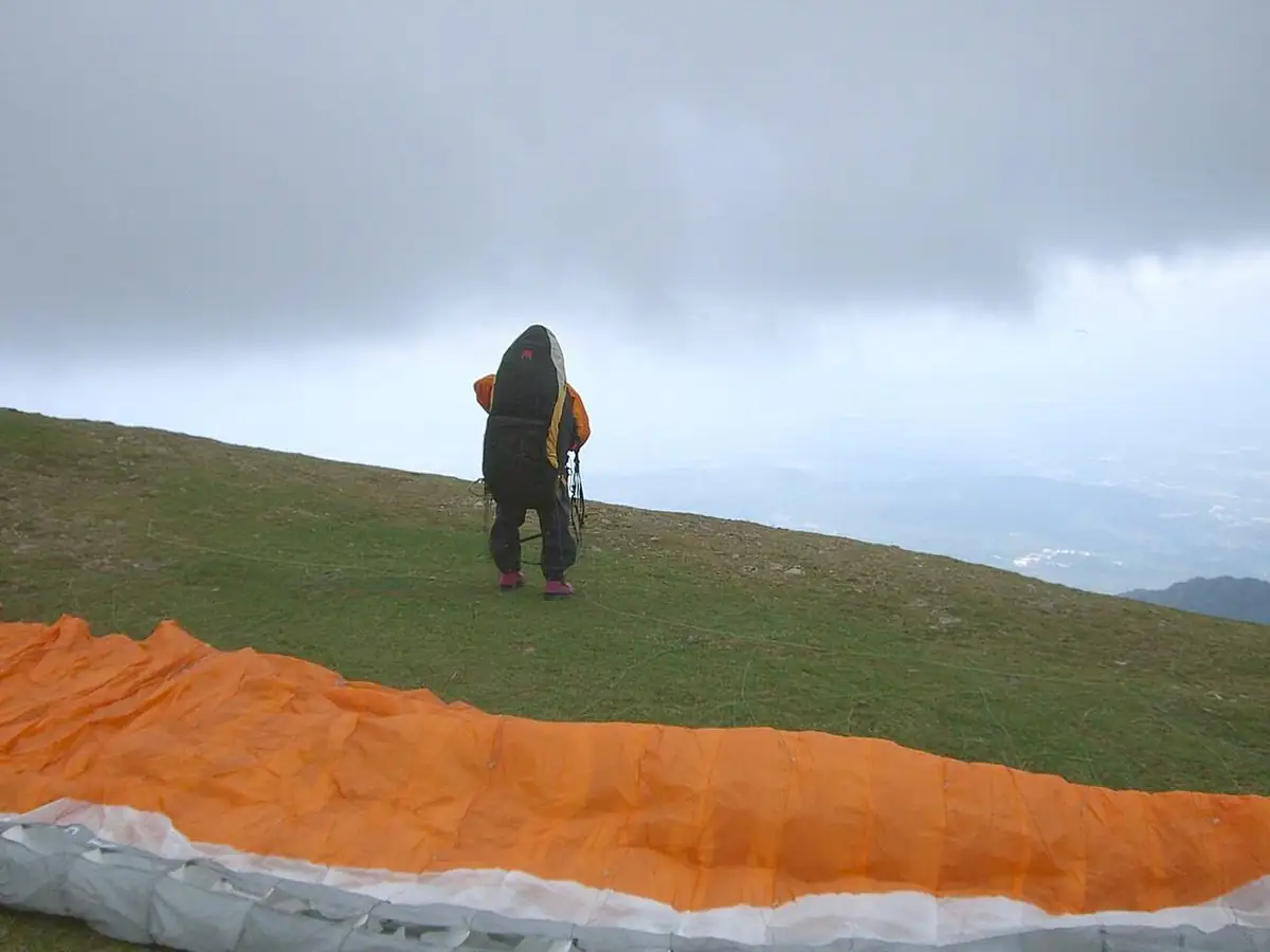 Paragliding above the hills near Bir Billing
