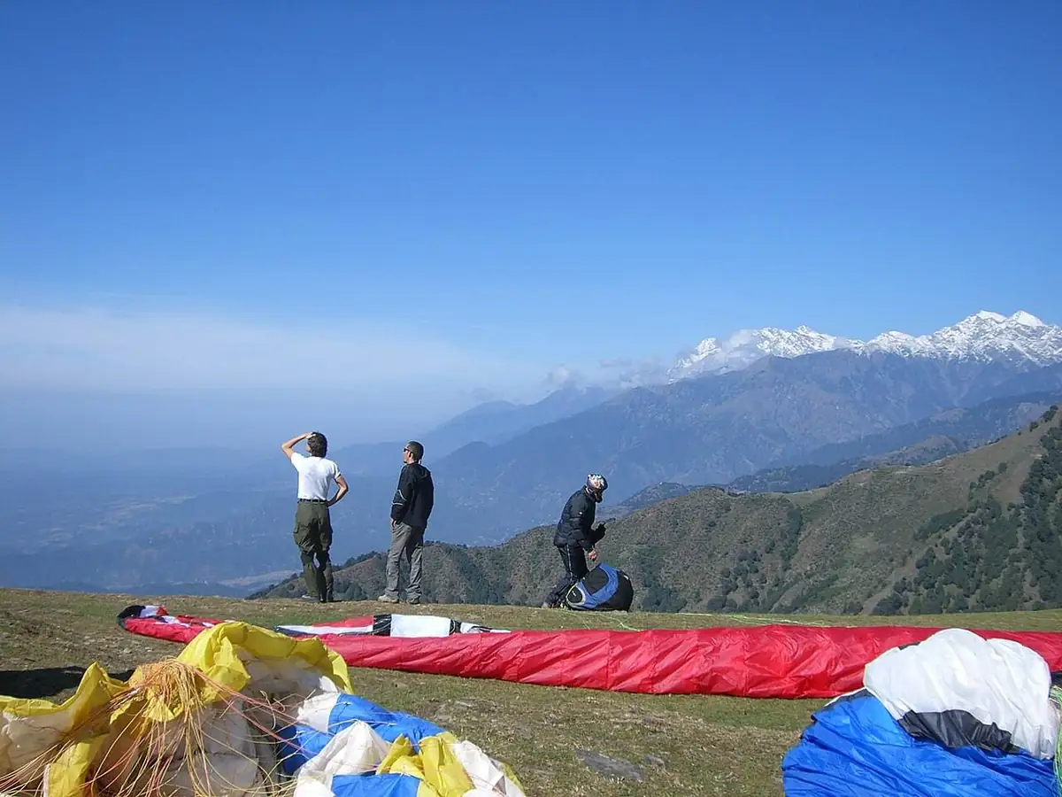 Paragliding pilot preparing for take-off above Bir Billing